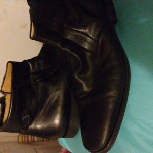 Black ankle leather boot with zipper. Excellent condition.